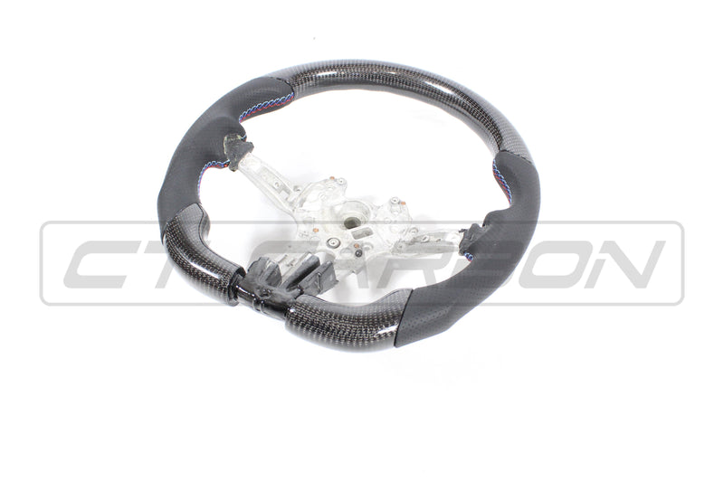 Load image into Gallery viewer, BMW FXX CARBON FIBRE / LEATHER FLAT BOTTOM STEERING WHEEL
